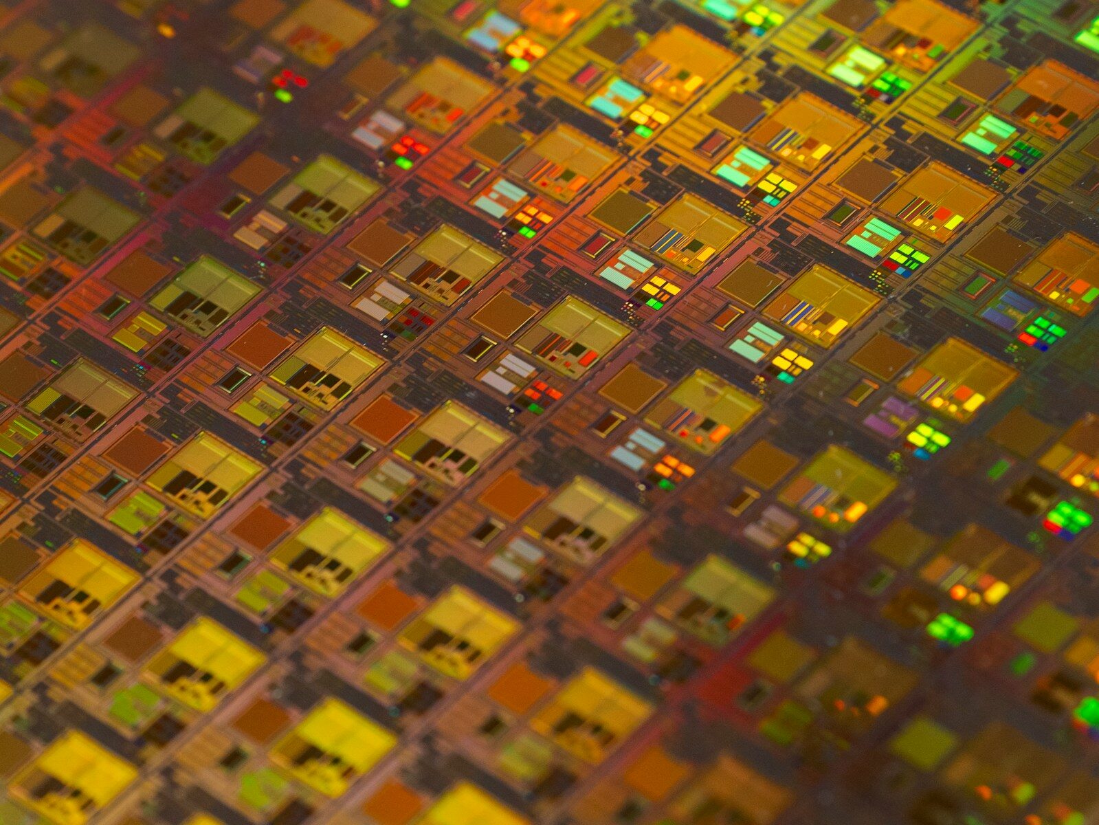 Silicon wafer in a cleanroom illustrating advanced semiconductor manufacturing research
