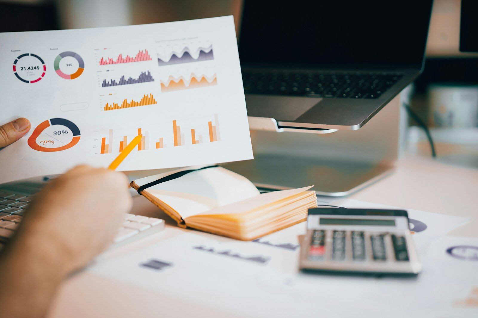 Business documents and calculator illustrating proposals to modernise UK corporate reporting